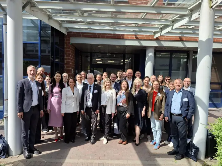 The Latvian delegation in front of the entrance of the Institute for Implant Technology and Biomaterials in Rostock-Warnemünde.